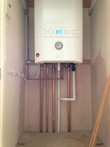 Removal of hot water cylinder and loft tanks and replaced with combi in the airing cupboard  
